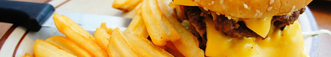 Eating Burger Sandwich Salad at Belleville Coney Island restaurant in Belleville, MI.